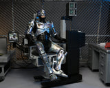 NECA Robocop – 7″ Scale Action Figure – Ultimate Battle Damaged Robocop with Chair